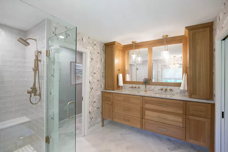 Interior-Impressions-Stillwater-MN-Classic-Coastal-Bathroom-Wood-Double-Vanity-Gold-Hardware-Marble-Herringbone-Tile-Glass-Shower-85c0a1a378ed4a8b8a51e2f8f9c3e880